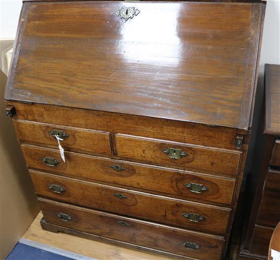 A mid 18th century oak bureau, W.91cm